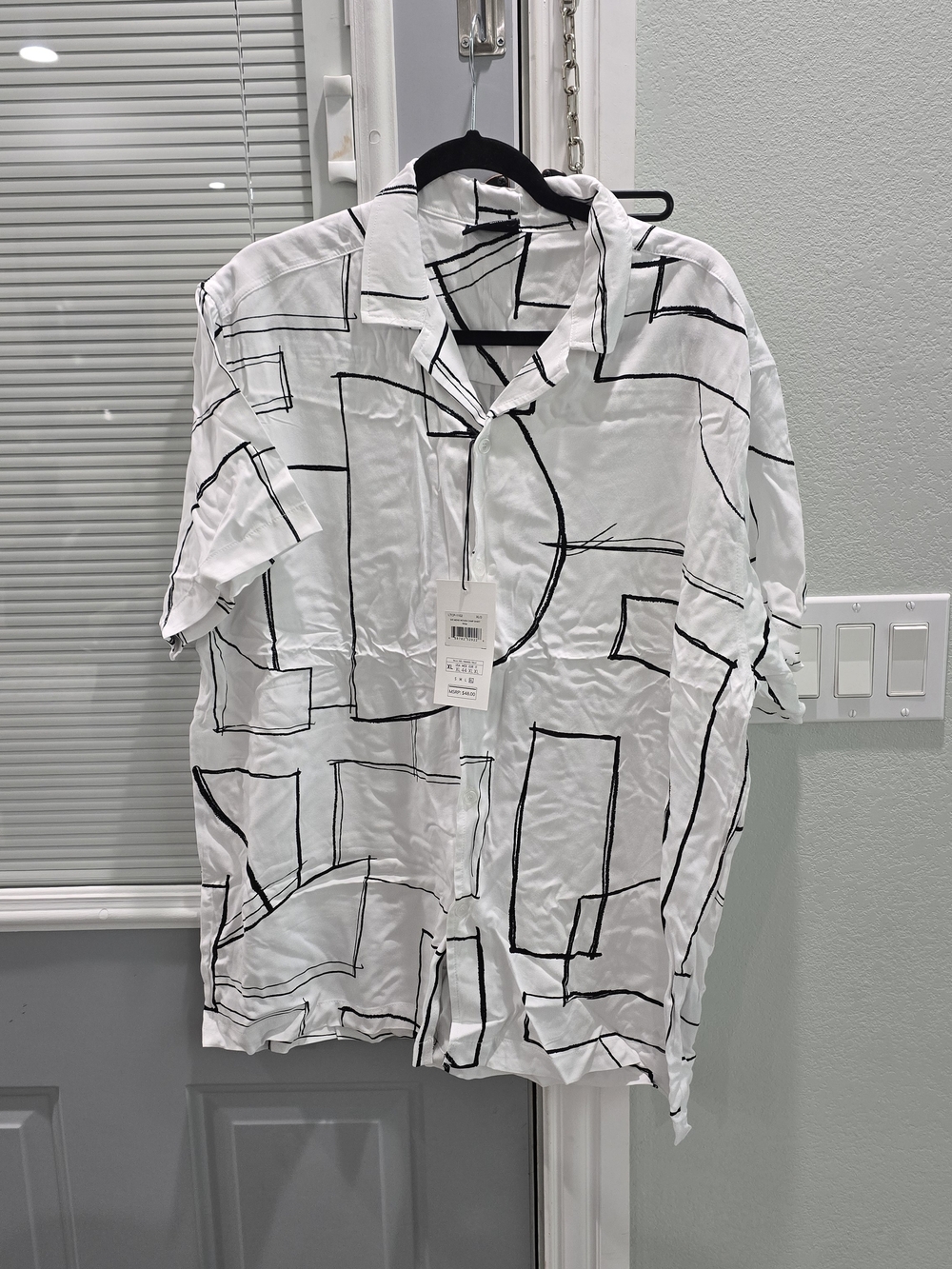 Men's White Short-Sleeve Button-Down Shirt with Black Geometric Print